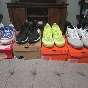 4 Pairs Of Nike Sneakers (2) Vaporman, AM 97, And Genome Size 14
